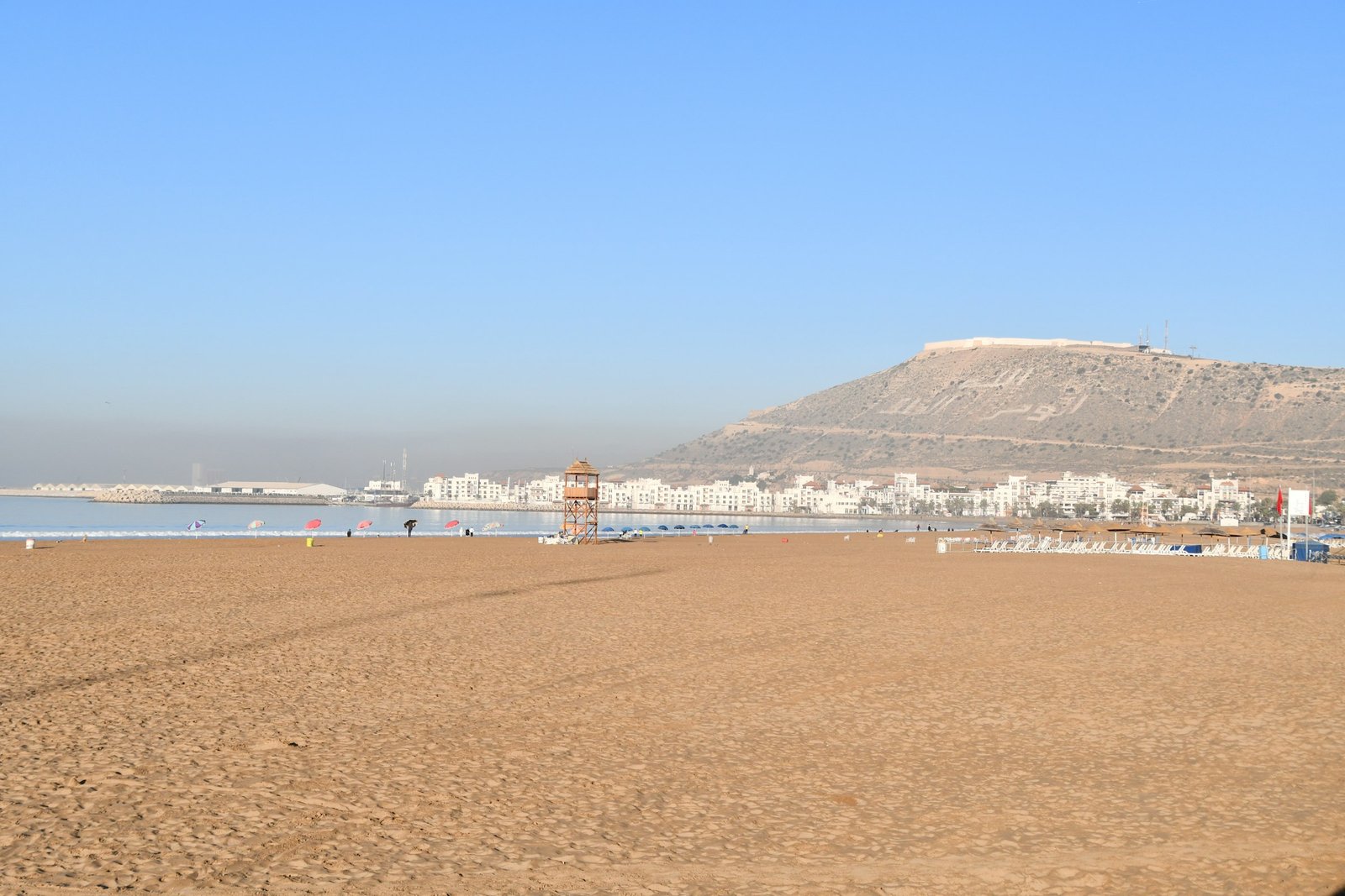 Agadir beach with Kasbah Oufella hill in the background, Morocco