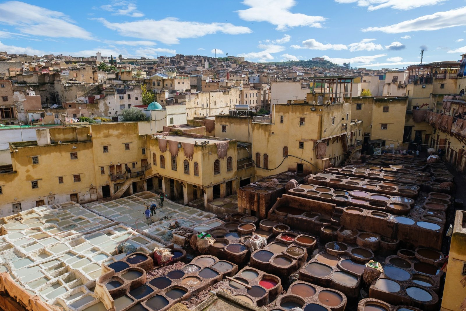 Traditional dye vats at a tannery in Fes, Morocco