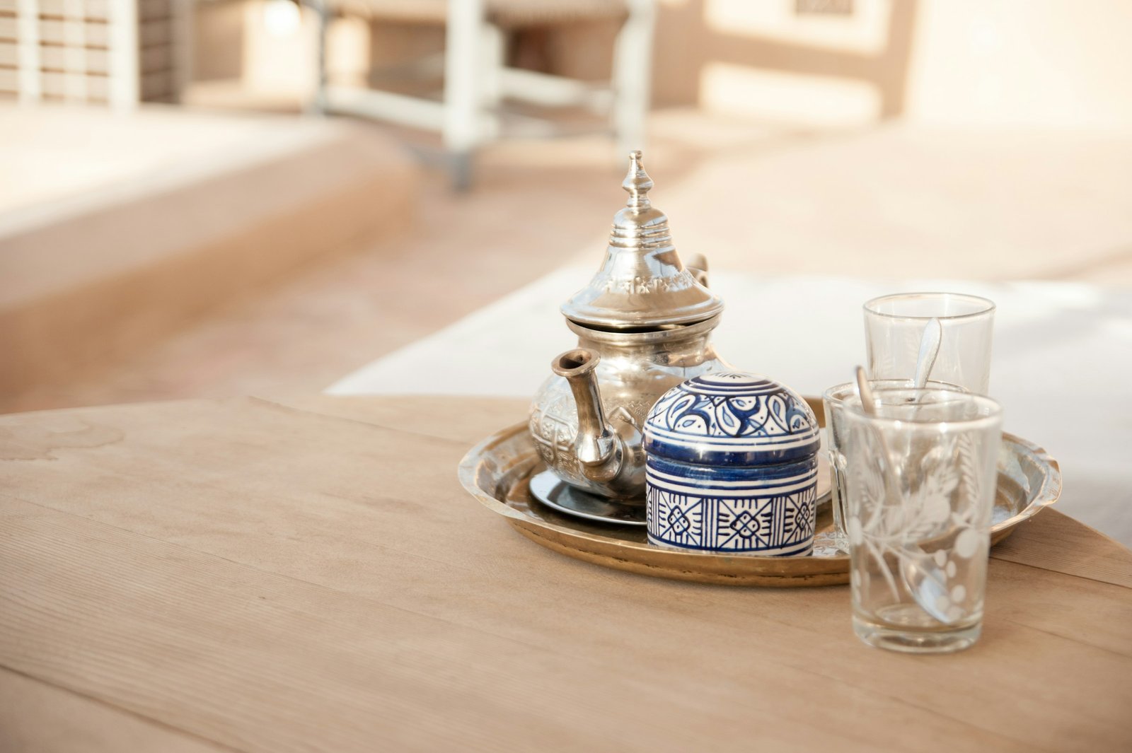 Traditional Moroccan teapot and glasses set on a tray