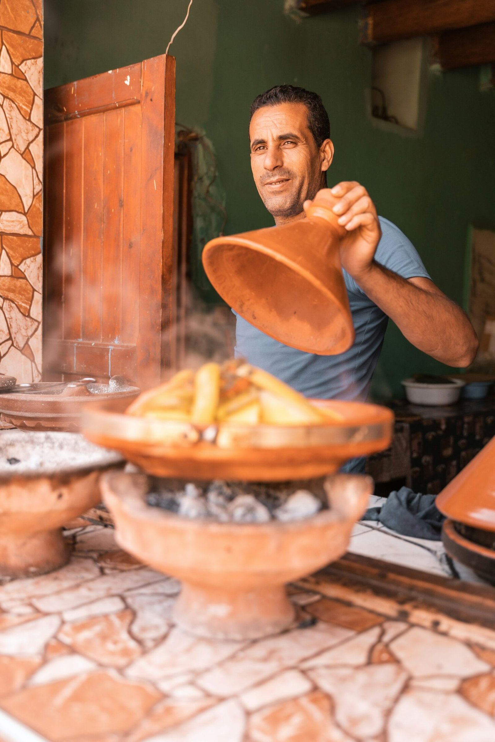A steaming Moroccan tagine served at the table