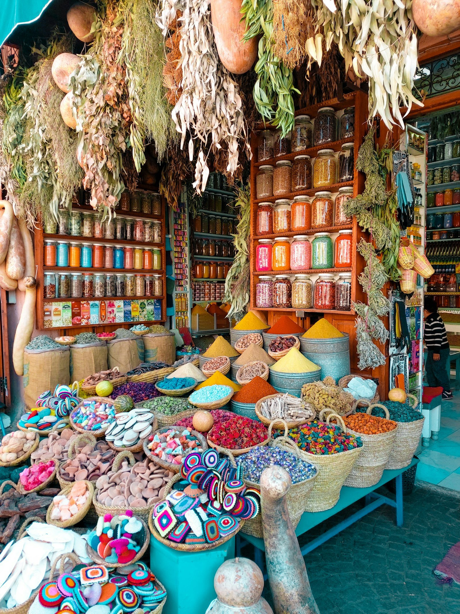 Rainbow spice pyramids in a Marrakech souk