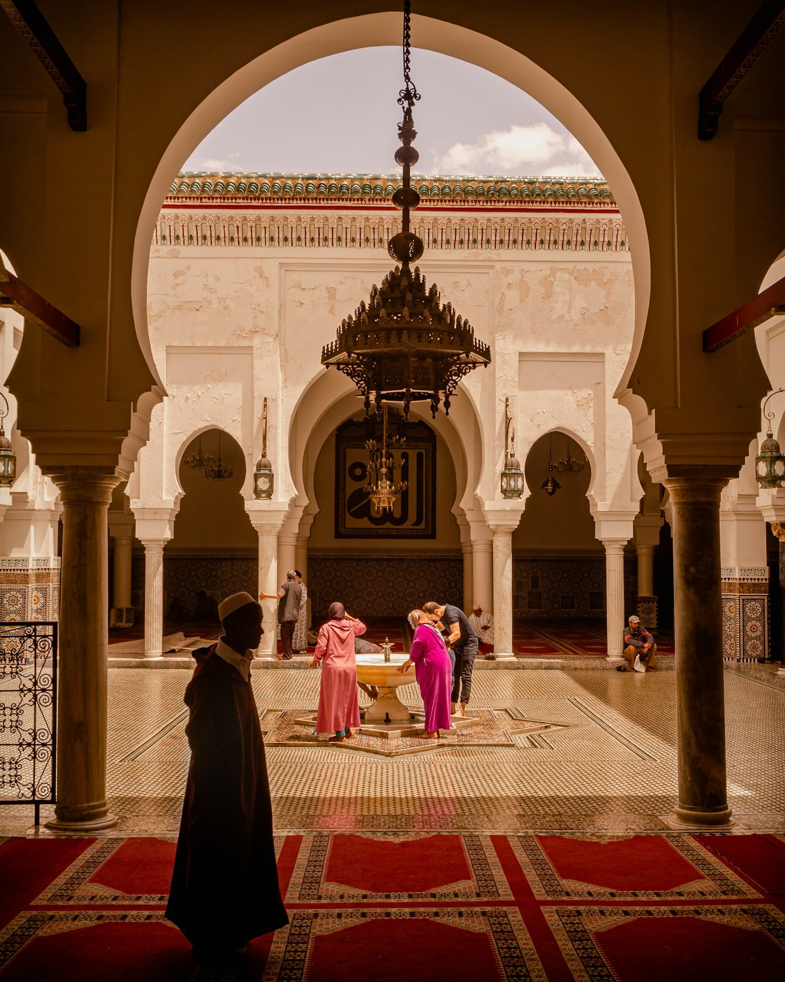 Ornate courtyard inside a historic Fez medrasa